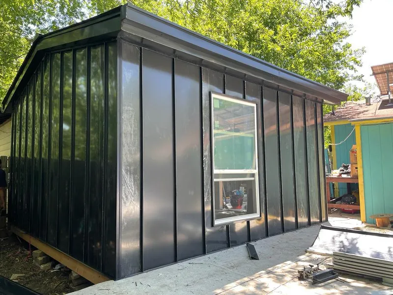 Black standing seam metal wall panels for Roof Inspection in Plumstead